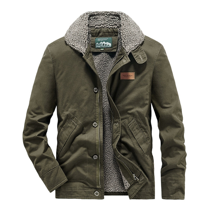 Green jacket with sherpa lining on a pink background