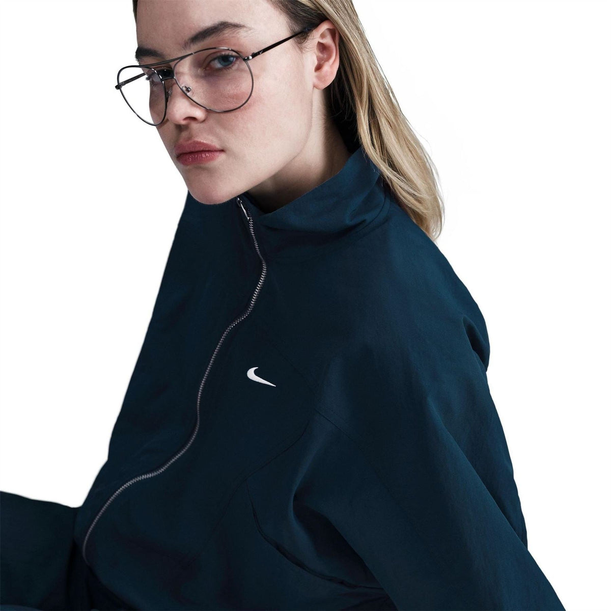 Nike Solid Patterned Zipped Pocket Windbreaker Jacket