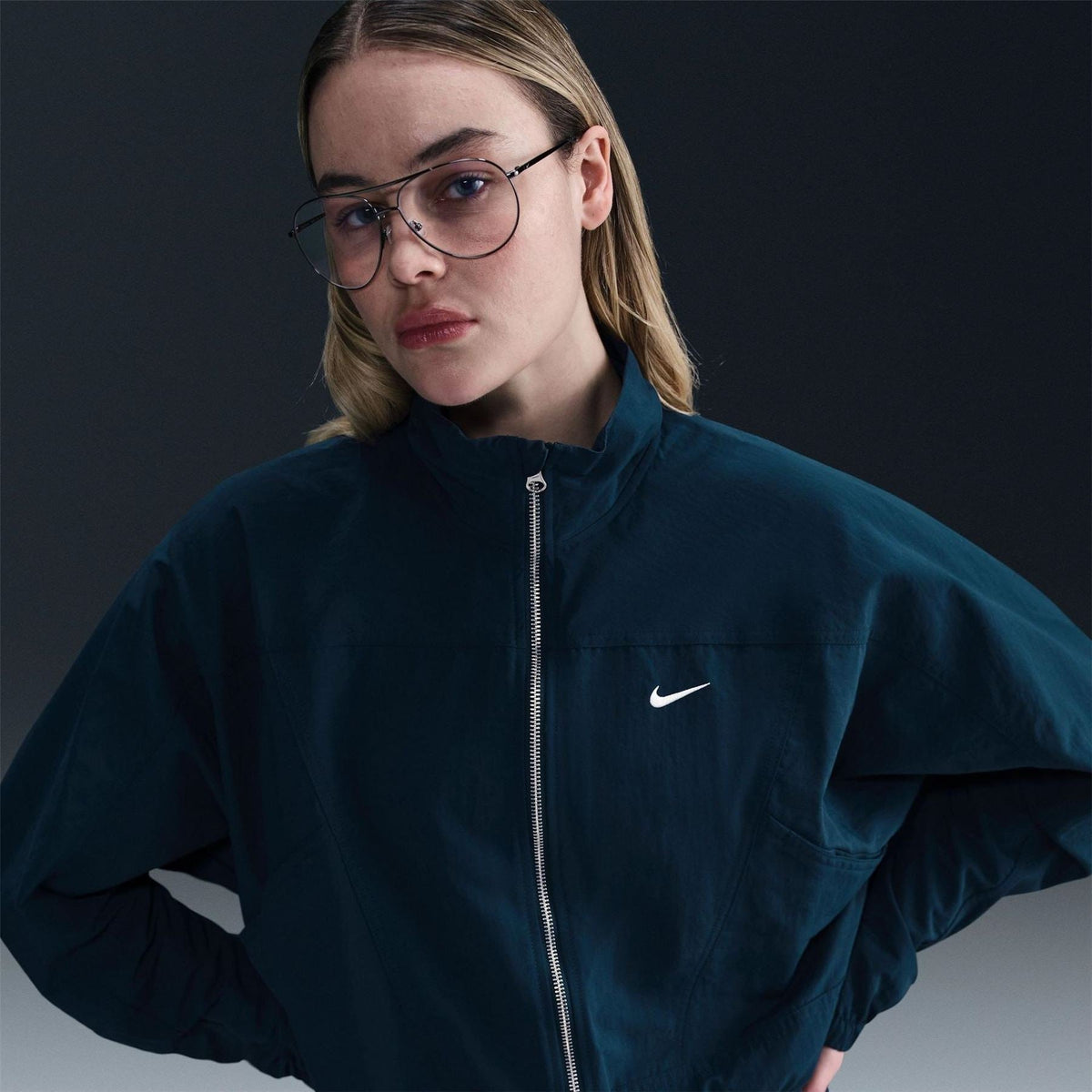Nike Solid Patterned Zipped Pocket Windbreaker Jacket